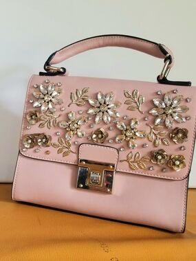 Aldo Light Pink Handbag/Clutch With Metal Detailing And Jewelry